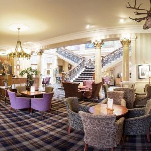 The Royal Highland Hotel’s lobby lounge has armchairs and coffee tables, perfect for co-working.