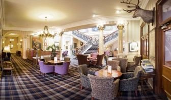 The Royal Highland Hotel’s lobby lounge has armchairs and coffee tables, perfect for co-working.