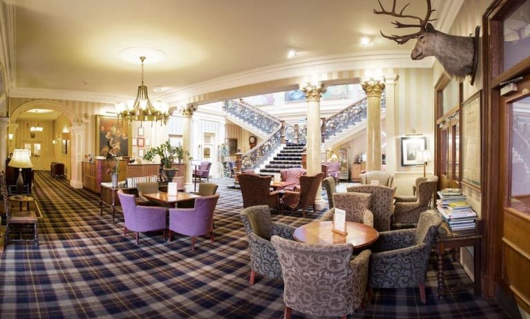 The Royal Highland Hotel’s lobby lounge has armchairs and coffee tables, perfect for co-working.