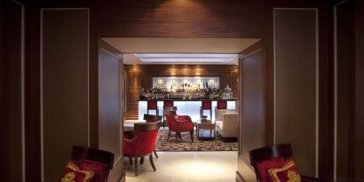 Hotel bar with lounge seating at The Royal Horseguards Hotel.