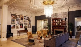 Lobby lounge with fireplace at The Royal Horseguards Hotel.