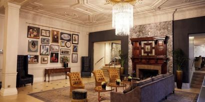 Lobby lounge with fireplace at The Royal Horseguards Hotel.