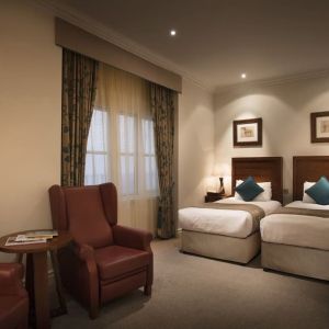 Day use twin room with lounge area at The Royal Horseguards Hotel.