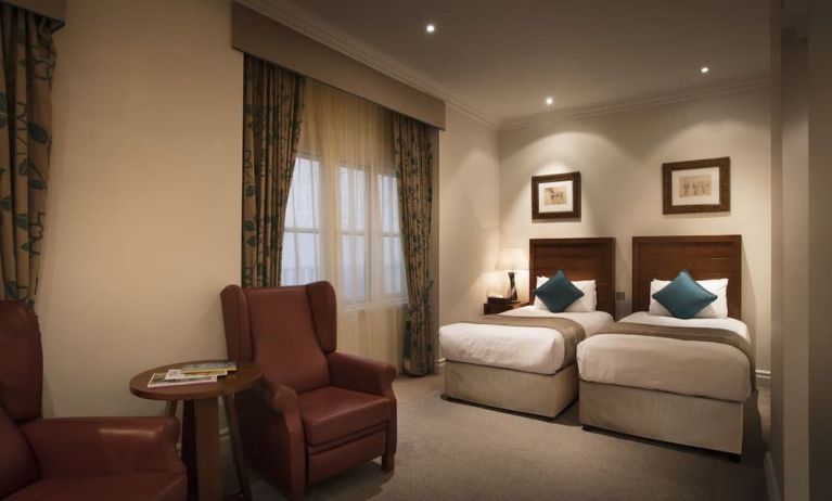 Day use twin room with lounge area at The Royal Horseguards Hotel.