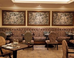 Dining area with comfortable seating at The Royal Horseguards Hotel.