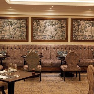 Dining area with comfortable seating at The Royal Horseguards Hotel.