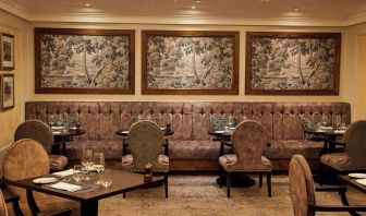 Dining area with comfortable seating at The Royal Horseguards Hotel.