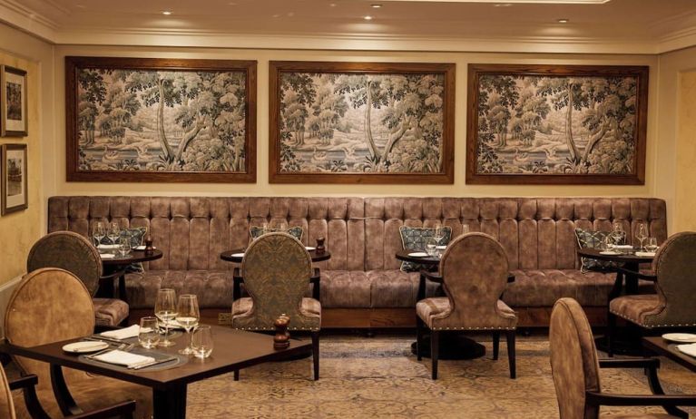 Dining area with comfortable seating at The Royal Horseguards Hotel.