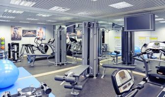 Fully equipped fitness center at Mercure Hotel London Paddington.