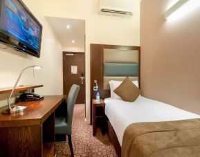 Day use room with TV, work desk and private bathroom at Mercure Hotel London Paddington.