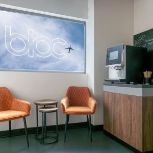 Coffee maker with lounge seating at Bloc Hotel.