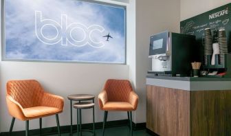 Coffee maker with lounge seating at Bloc Hotel.