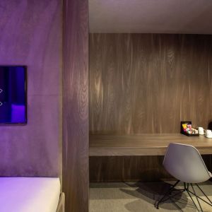 Work desk and coffee maker inside a day use room at Bloc Hotel.