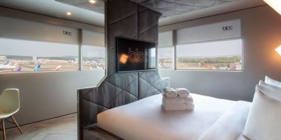 Bright and spacious day use superior room with view to the airport at Bloc Hotel.