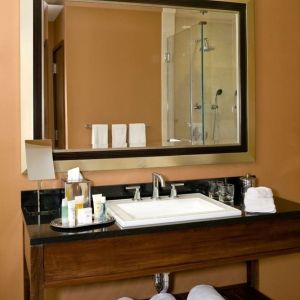 Guest bathroom with shower at The Bostonian Boston, A Millennium Hotel.