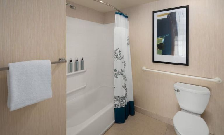 Guest bathroom with shower and tub at Residence Inn By Marriott Portland Airport At Cascade Station.