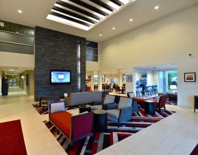 Lobby and coworking lounge at Hawthorn Suites By Wyndham El Paso Airport.