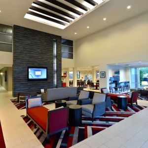 Lobby and coworking lounge at Hawthorn Suites By Wyndham El Paso Airport.