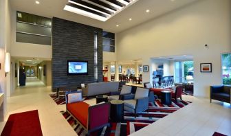 Lobby and coworking lounge at Hawthorn Suites By Wyndham El Paso Airport.