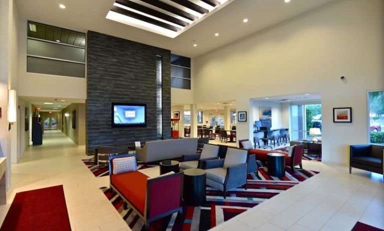 Lobby and coworking lounge at Hawthorn Suites By Wyndham El Paso Airport.