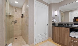 Guest bathroom with shower at The Atlantic Hotel & Spa.