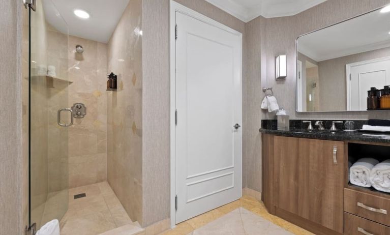 Guest bathroom with shower at The Atlantic Hotel & Spa.