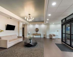 Lobby and coworking lounge at Best Western Executive Hotel Of New Haven-West Haven.