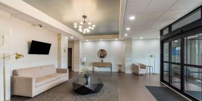 Lobby and coworking lounge at Best Western Executive Hotel Of New Haven-West Haven.