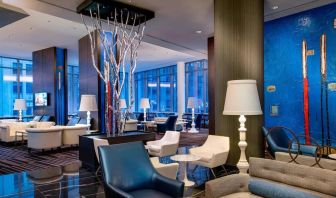 Lobby and coworking lounge at Courtyard By Marriott New York Manhattan/Central Park.