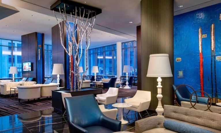 Lobby and coworking lounge at Courtyard By Marriott New York Manhattan/Central Park.