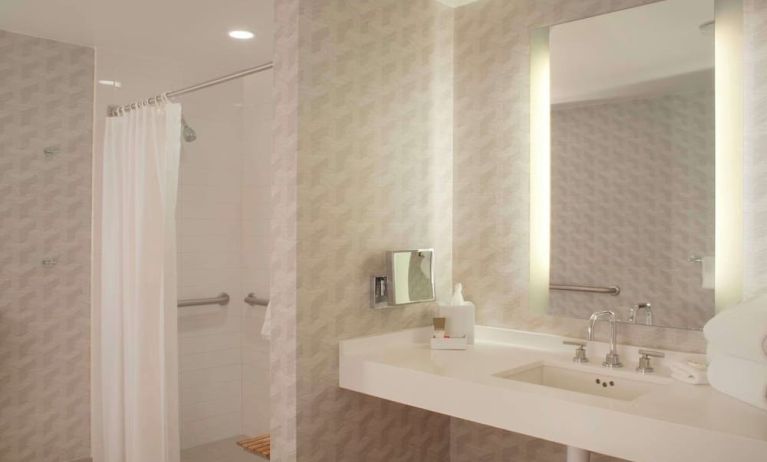 Guest bathroom with shower at Hyatt Regency Los Angeles International Airport.