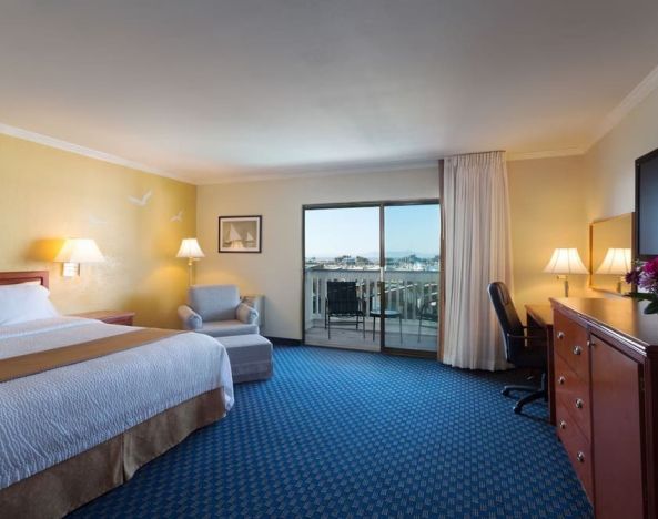 Spacious day use room with balcony at The Marina Inn On San Francisco Bay.