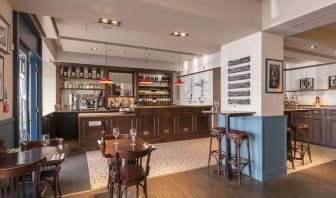 Dining area at Mercure Hotel London Hyde Park.