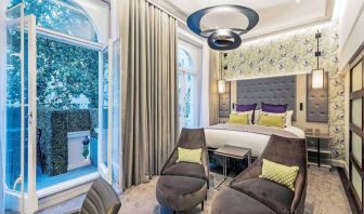 Day use suite with lounge seating and work desk at Mercure Hotel London Hyde Park.