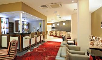 Bar lounge with comfortable seating at Mercure London Bloomsbury.