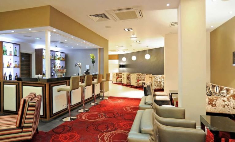 Bar lounge with comfortable seating at Mercure London Bloomsbury.