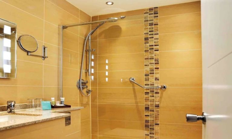 Guest bathroom with shower at Mercure London Bloomsbury.