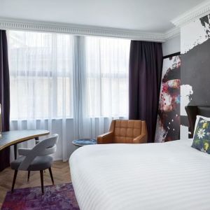 Bright and spacious king room with work desk at NYX Hotel London Holborn By Leonardo.