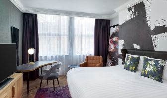 Bright and spacious king room with work desk at NYX Hotel London Holborn By Leonardo.