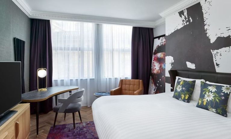 Bright and spacious king room with work desk at NYX Hotel London Holborn By Leonardo.