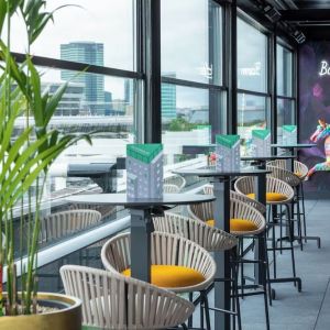 Rooftop terrace with lounge sitting at NYX Hotel London Holborn By Leonardo.