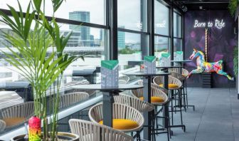 Rooftop terrace with lounge sitting at NYX Hotel London Holborn By Leonardo.