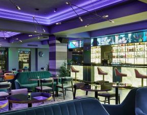 Hotel bar with lounge seating at NYX Hotel London Holborn By Leonardo.