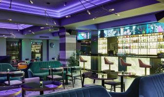 Hotel bar with lounge seating at NYX Hotel London Holborn By Leonardo.