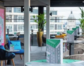 Rooftop terrace with lounge area at NYX Hotel London Holborn By Leonardo.