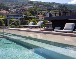 Outdoor seasonal pool at Keight Hotel Opatija.