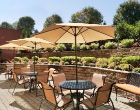 Outdoor terrace at Hampton Inn New York - LaGuardia Airport.