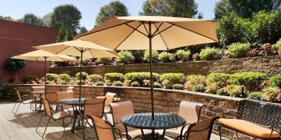 Outdoor terrace at Hampton Inn New York - LaGuardia Airport.