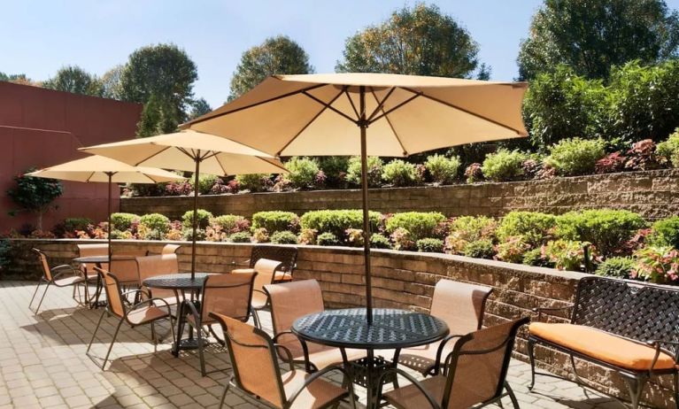 Outdoor terrace at Hampton Inn New York - LaGuardia Airport.