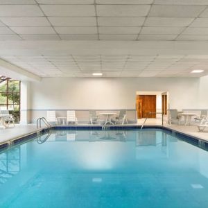 Indoor pool area at Hampton Inn New York - LaGuardia Airport.